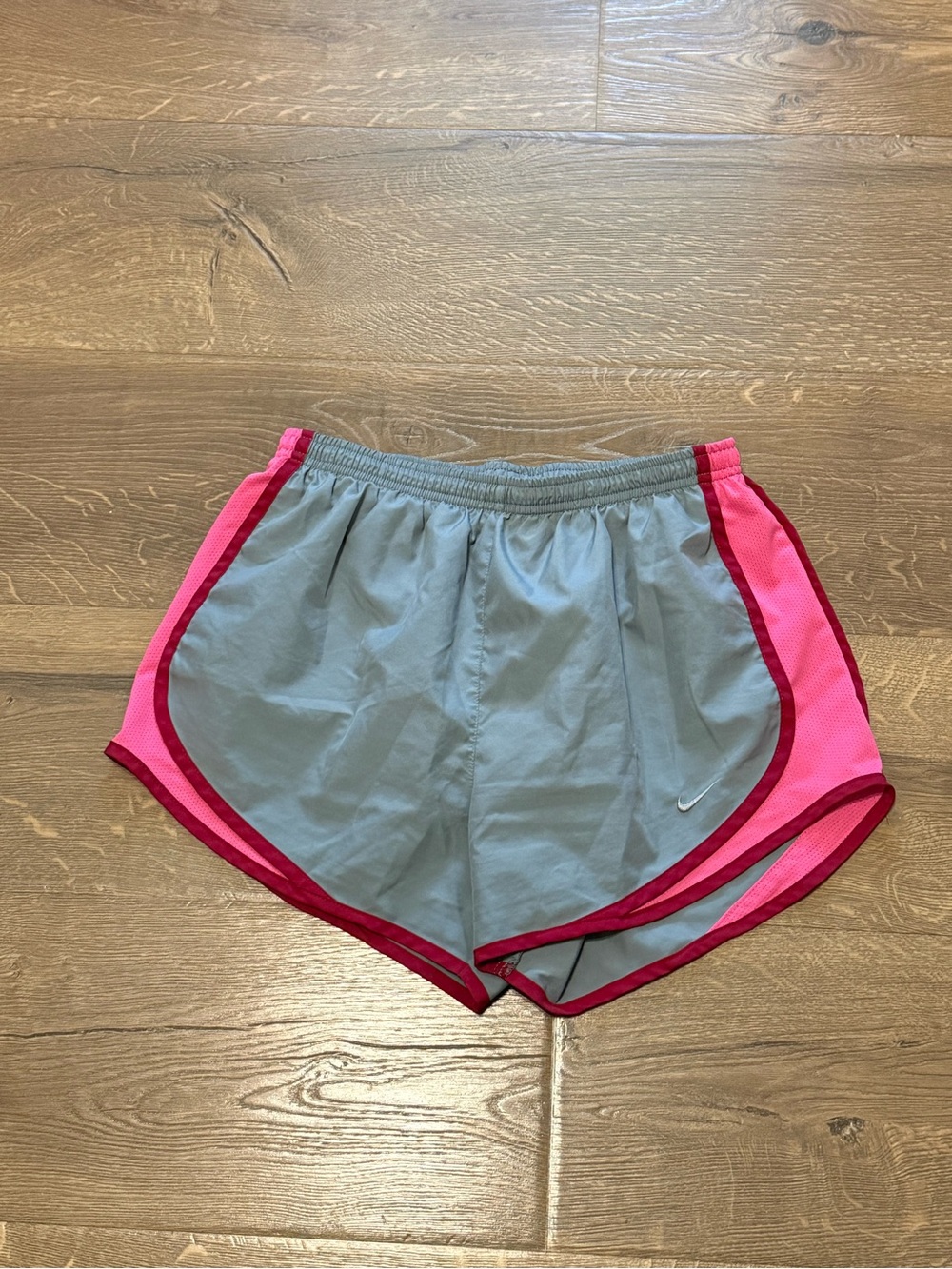 Nike Women's Grey Athletic Shorts with Pink and Red Trim